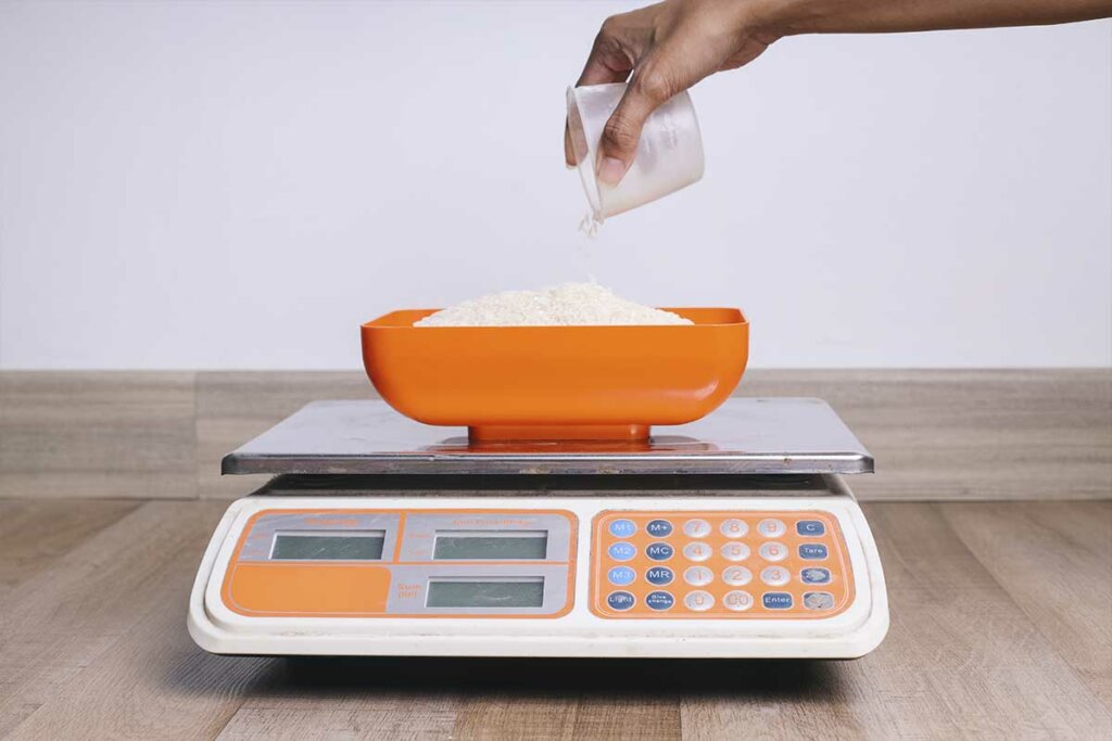 cuánto pesa un grano de arroz