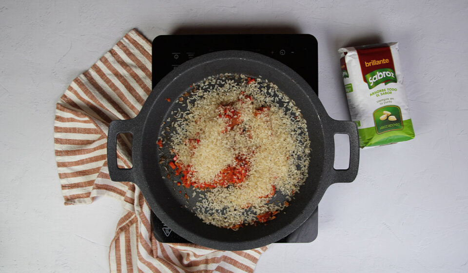 Cocinar arroz en Arroz con caracoles