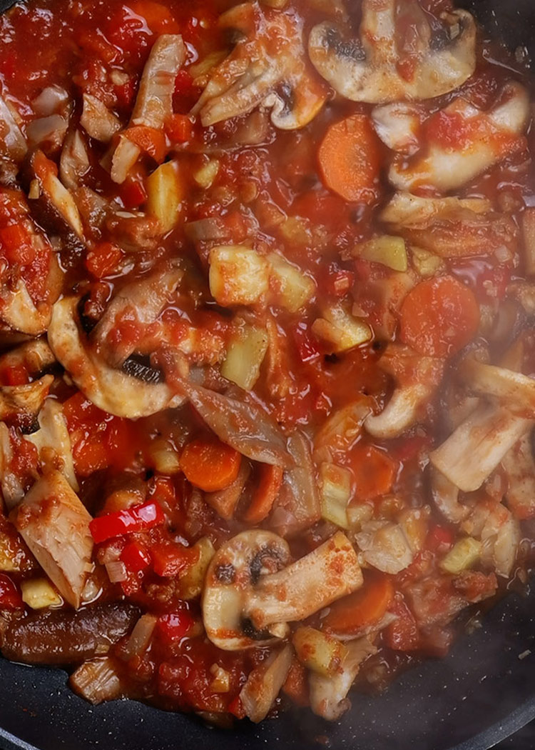 Finalizar sofrito de arroz con setas y verduras