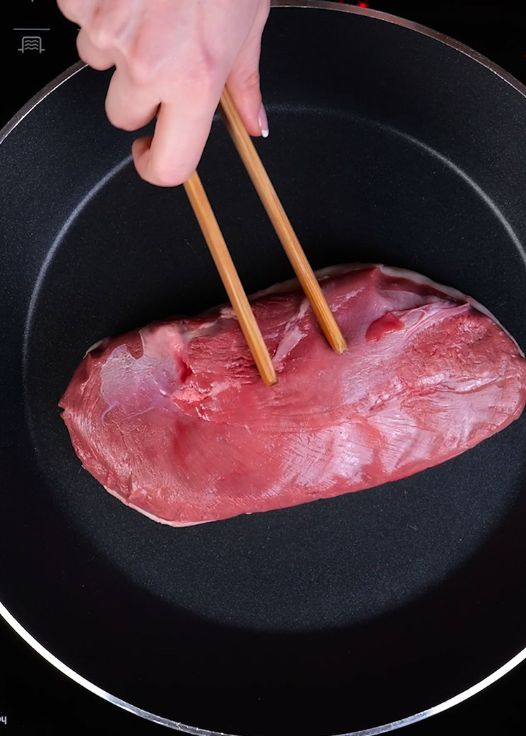 Cocinar pato para arroz con magret de pato